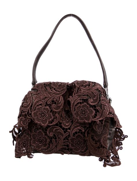 prada lace bag|More.